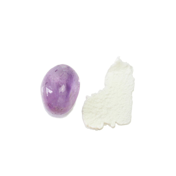 Terpenic Labs Euraderm 30ml stretch marks body lotion product swatch with an amethyst crystal